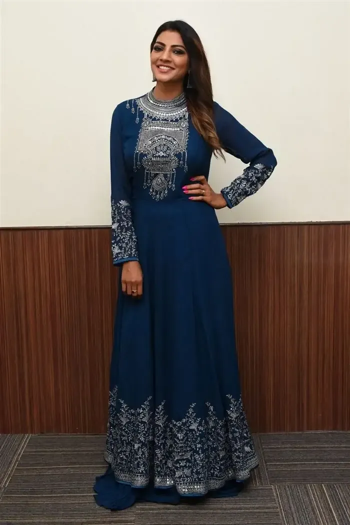 Indian Actress Lahari Shari Long Hair Smiling Face in Blue dress